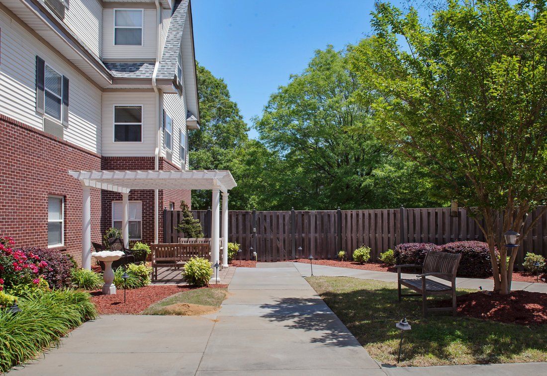 Senior living community in North Hills with lush green yards, modern houses and street views.