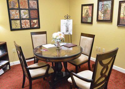 Interior view of Regency Retirement Village in Jackson featuring dining room with furniture and decor.