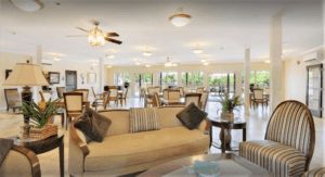Interior view of SummerHouse Bay Cove senior living community featuring modern decor and furniture.