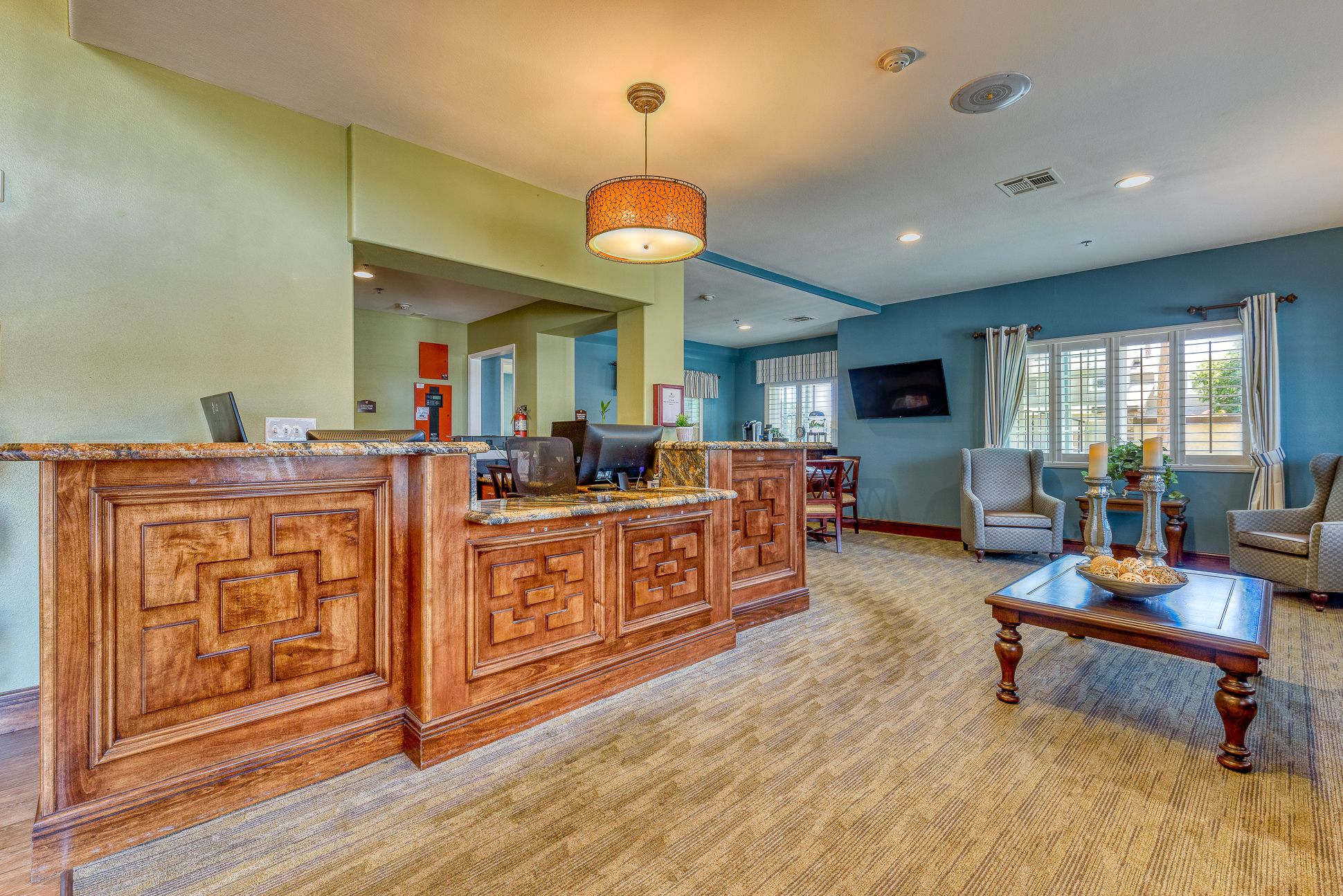 Interior view of Pacifica Senior Living South Coast with hardwood floors and modern decor.