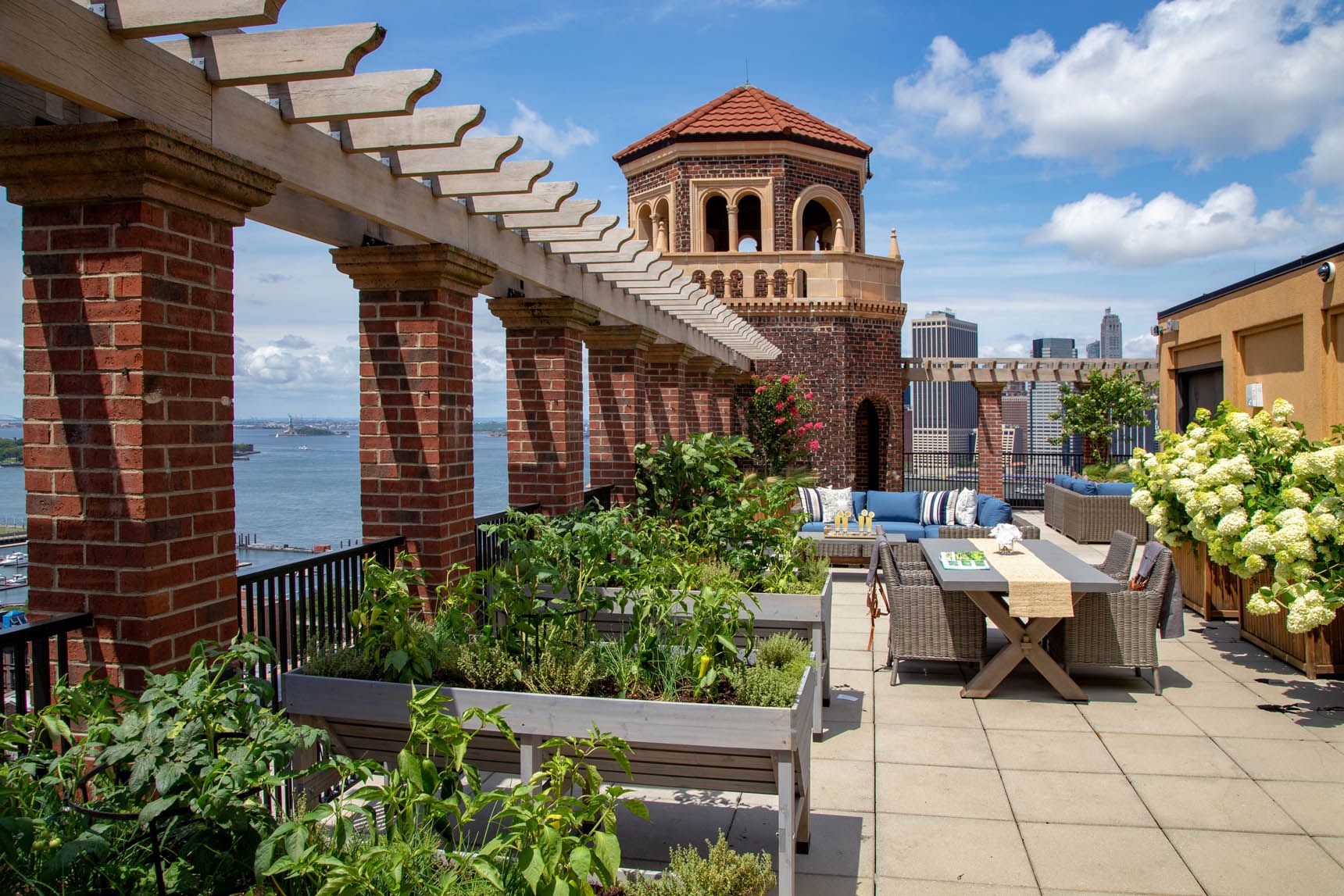 Senior living community, The Watermark at Brooklyn Heights, featuring terrace architecture and garden.