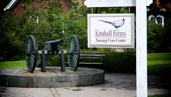 Senior living community at Kimball Farms Nursing Care Center with lush greenery and wildlife.