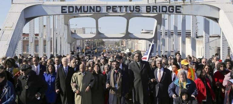 John Lewis leads marchers across the Edmond Pettus Bridge