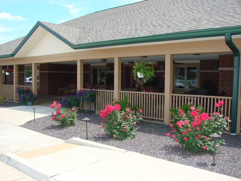 Senior living community in Grand Prairie of Macomb featuring houses, porches, and lush yards.
