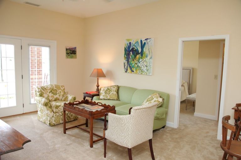 Senior living room interior at The Lodge At Old Trail with cozy furniture and home decor.