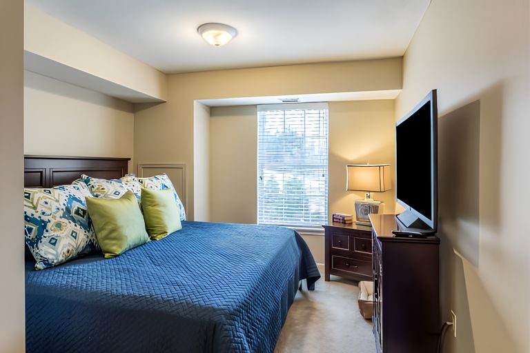 elison-independent-living-of-orchard-glenelison-independent-living-of-orchard-glen-model-bedroom-11-670_sly_high_res_