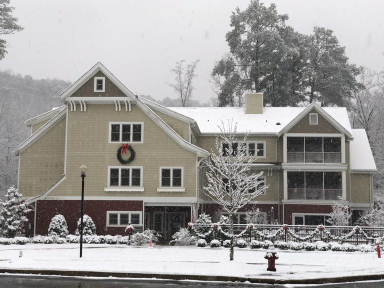 Senior living community, St. Martin's In The Pines, with snowy suburb scenery and architecture.
